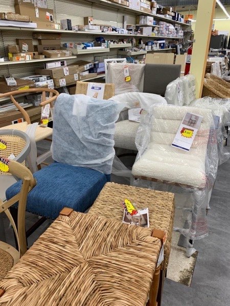 Variety of upholstered chairs on the showroom floor